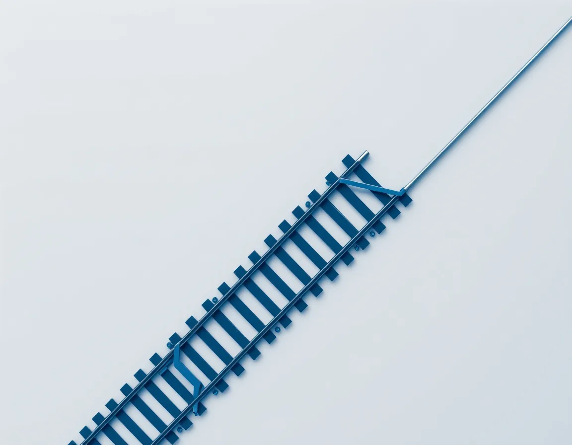 A railway track with a switch where a new line branches off, representing how API versions branch off for breaking changes while revisions stay on the same line